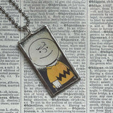 Snoopy, Charlie Brown, comic strip illustrations from vintage Peanuts book, up-cycled to hand-soldered glass pendant