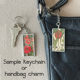 1  Red poppy,  Lotus, botanical illustrations, up-cycled to soldered glass pendant