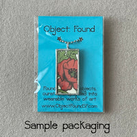 1 Rising sun, orange grove, vintage matchbox illustration, upcycled to hand-soldered glass pendant