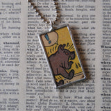 Bulldog with exclamation mark, CRACK! onomatopoeia, vintage comic book illustration, upcycled to soldered glass pendant