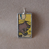 Bulldog with exclamation mark, CRACK! onomatopoeia, vintage comic book illustration, upcycled to soldered glass pendant