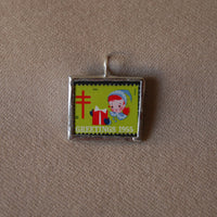 Vintage 1955 Christmas Seals Stamp, up-cycled to 2-sided, hand-soldered glass pendants, girl in snowsuit