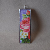 Roses and daisy flowers, vintage early 20th century die cut ephemera, up-cycled to soldered glass pendant