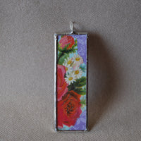 Roses and daisy flowers, vintage early 20th century die cut ephemera, up-cycled to soldered glass pendant