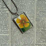 Hibiscus and poppy flowers, botanical illustrations, up-cycled to soldered glass pendant