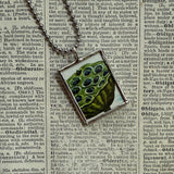 Lotus flower, seed pod, vintage illustrations up-cycled to soldered glass pendant