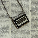 Handle with Care, vintage dictionary pages, up-cycled to soldered glass pendant