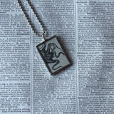 Octopus, vintage 1930s dictionary illustration, up-cycled to hand soldered glass pendant