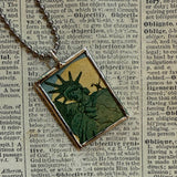 Statue of Liberty, American flag upcycled to hand-soldered glass pendant