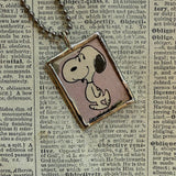 Snoopy, comic strip illustrations from vintage Peanuts book, up-cycled to hand-soldered glass pendant