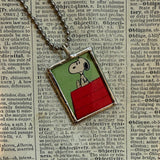 Snoopy, comic strip illustrations from vintage Peanuts book, up-cycled to hand-soldered glass pendant
