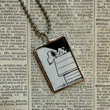 Snoopy, comic strip illustrations from vintage Peanuts book, up-cycled to hand-soldered glass pendant