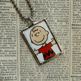 Snoopy, comic strip illustrations from vintage Peanuts book, up-cycled to hand-soldered glass pendant