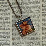 Medieval dragon illustrations, upcycled to hand soldered glass pendant, upcycled to soldered glass pendant