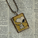 Snoopy, comic strip illustrations from vintage Peanuts book, up-cycled to hand-soldered glass pendant