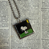 Snoopy, comic strip illustrations from vintage Peanuts book, up-cycled to hand-soldered glass pendant