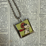 Snoopy, comic strip illustrations from vintage Peanuts book, up-cycled to hand-soldered glass pendant