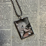 Dumbo, vintage illustrations, up-cycled to soldered glass pendant