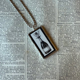 Champagne bottles, antique woodcut illustrations, up-cycled to soldered glass pendant