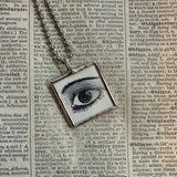 Human eye and daisy flower, vintage victorian woodcut illustrations, up-cycled to soldered glass pendant