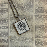 Human eye and daisy flower, vintage victorian woodcut illustrations, up-cycled to soldered glass pendant