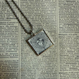 Sacred heart, religious iconography, upcycled to soldered glass pendant
