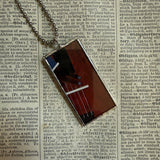 Romaire Bearden paintings, upcycled to hand soldered glass pendant