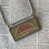 Sunrise, Kerash onomatopoeia, vintage comic book illustration, upcycled to soldered glass pendant