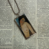 Modigliani woman, upcycled to hand soldered glass pendant