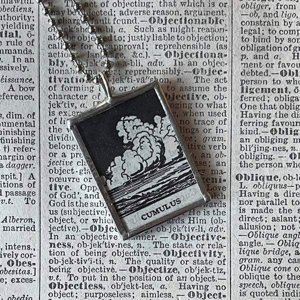 Cumulus clouds, vintage dictionary illustration, upcycled to soldered glass pendant