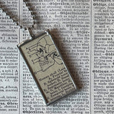 Skulls - vintage dictionary illustration, up-cycled to soldered glass pendant