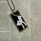 Emily the Strange, vintage illustrations up-cycled to soldered glass pendant