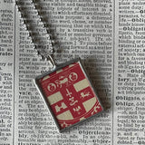 Switzerland, vintage button images, upcycled hand soldered glass pendant