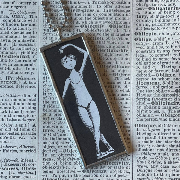 Gorey dancers illustrations, hand-soldered glass pendant