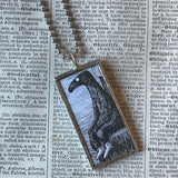 Gorey Doubtful Guest illustrations, hand-soldered glass pendant