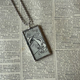 Spy vs. Spy, MAD Magazine comic illustrations, upcycled to soldered glass pendant