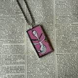 Snoopy, comic strip illustrations from vintage Peanuts book, up-cycled to hand-soldered glass pendant