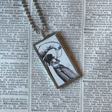 Gorey bird and man, vintage book illustrations, hand-soldered glass pendant