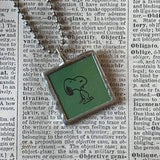 Snoopy, comic strip illustrations from vintage Peanuts book, up-cycled to hand-soldered glass pendant