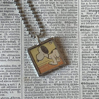 Snoopy, comic strip illustrations from vintage Peanuts book, up-cycled to hand-soldered glass pendant