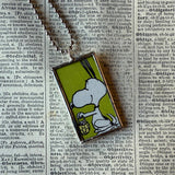 Snoopy, comic strip illustrations from vintage Peanuts book, up-cycled to hand-soldered glass pendant