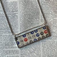 Vintage BINGO and KENO game card graphics, upcycled to soldered glass pendant