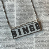 Vintage BINGO and KENO game card graphics, upcycled to soldered glass pendant