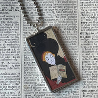 Victorian women, reading and with a white cat, up-cycled to soldered glass pendant