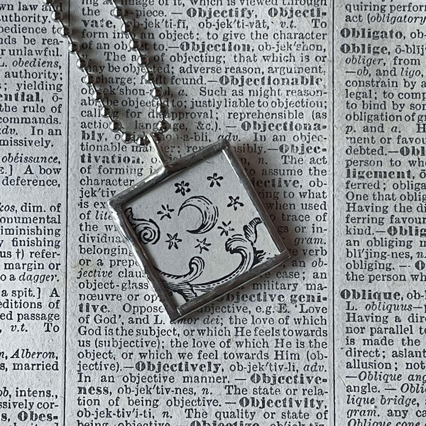 Sun and Moon, antique woodcut illustrations, upcycled to soldered glass pendant