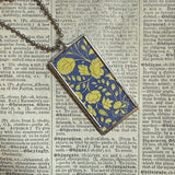 Hummingbird in fancy dress, vintage illustrations, up-cycled to soldered glass pendant