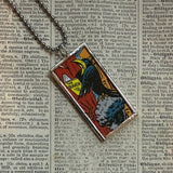 Raven comic illustrations, up-cycled to soldered glass pendant