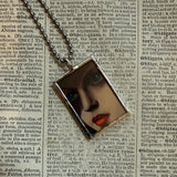 Tamara de Lempicka painting upcycled to hand soldered glass pendant