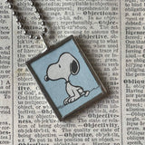 Snoopy, comic strip illustrations from vintage Peanuts book, up-cycled to hand-soldered glass pendant