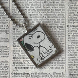 Snoopy, comic strip illustrations from vintage Peanuts book, up-cycled to hand-soldered glass pendant